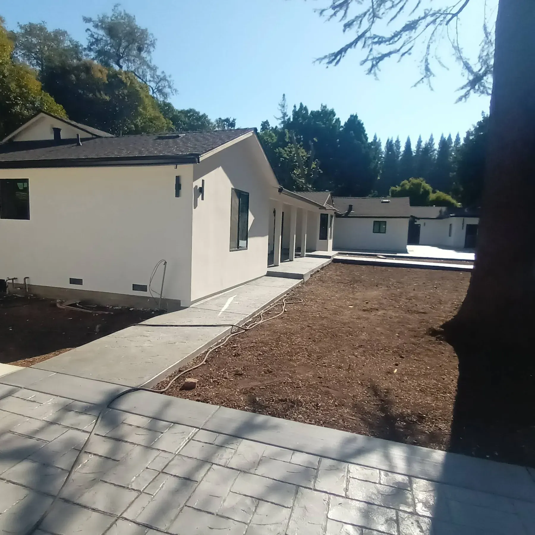 House painting service area San Jose, CA: freshly painted stucco ranch home
