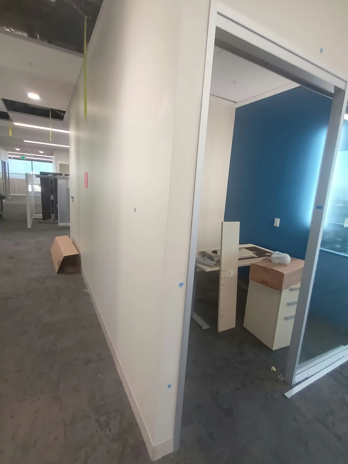 Commercial painting in San Jose, CA: office with a blue accent wall