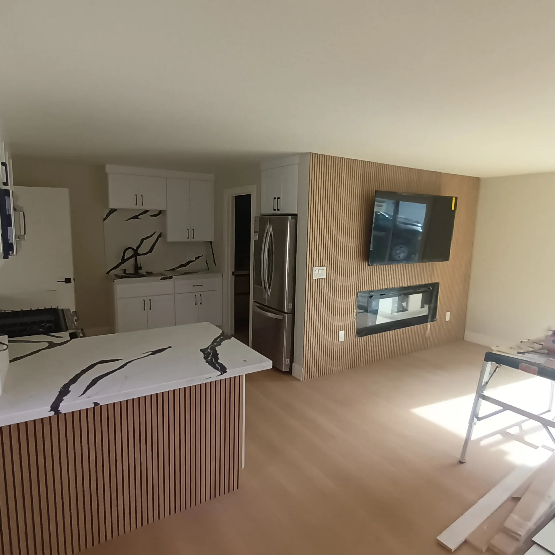 Interior painting in San Jose, CA: remodeled kitchen and living area with fresh paint